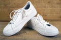 Pair of white sneakers with laces Royalty Free Stock Photo