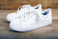 Pair of white sneakers with laces Royalty Free Stock Photo