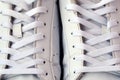 Pair of White Used Sneakers with shoelaces Royalty Free Stock Photo