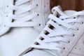 Pair of White Used Sneakers with shoelaces Royalty Free Stock Photo