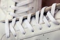 Pair of White Used Sneakers with shoelaces Royalty Free Stock Photo