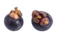 A pair of whole mangosteen