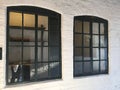 Pair of windows in a factory Royalty Free Stock Photo