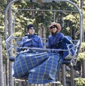 A Pair of Women Ride Arizona Snowbowl`s Scenic Chairlift Near Fl