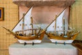 A pair of wooden model of fishing boat sailing as a gift in the Heritage folk village in Abu Dhabi, United Arab Emirates