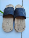 a pair of wooden sandals