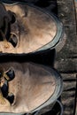 A pair of worn old brown leather boots Royalty Free Stock Photo