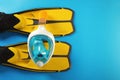 Pair of yellow flippers and diving mask Royalty Free Stock Photo