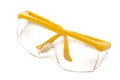 A pair of yellow framed industrial safety glasses