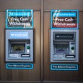 Pair of Yorkshire Bank atm cash machines showing company sign, logo and branding