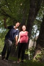 Pair of young lovers running in the park Royalty Free Stock Photo