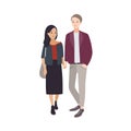 Pair of young man and woman of different nationalities dressed in stylish clothing