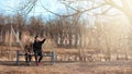 A pair of young people met in the park. Lovers are sitting on a Royalty Free Stock Photo