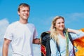 Paired up for paragliding. a happy young couple getting ready for a day of paragliding. Royalty Free Stock Photo