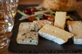 Pairing of scotch whisky and farmers scottish cheeses cheddar, stilton, blue cheese, brie, tasting of whiskey and cheese in