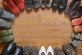 Pairs of different shoes standing in a circle Royalty Free Stock Photo