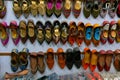 Pairs of Rajasthani ladies` shoes, at display for sale. Jaisalmer, Rajasthan, India
