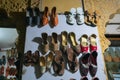 Pairs of Rajasthani mens` and womens` shoes, at display for sale. Jaisalmer, Rajasthan, India Royalty Free Stock Photo