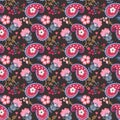 Paisley seamless pattern with leaves and stylized flowers on black background in vector. Indian, russian motives. Royalty Free Stock Photo