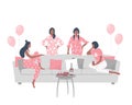 Pajama party. Slumber party. Young women in pajamas are sitting on the couch and talking. Some women are standing near the sofa Royalty Free Stock Photo