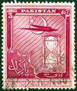 PAKISTAN - CIRCA 1951: A stamp printed in Pakistan shows airplane and hourglass, circa 1951.