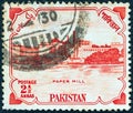 PAKISTAN - CIRCA 1955: A stamp printed in Pakistan shows Karnaphuli Paper Mill, East Bengal, circa 1955.