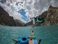 Pakistan Flag On A Boat At Beautiful view of attabad lake Karakoram Highway Royalty Free Stock Photo