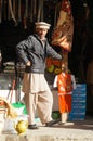 A Pakistani man wearing traditional clothing , Pakistan