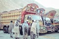 Pakistani men and beautiful decorated trucks.