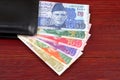 Pakistani money in the black wallet Royalty Free Stock Photo