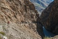 Pakistani trucks travelling along the Karakoram highway. Gilgit Baltistan, Pakistan. Royalty Free Stock Photo