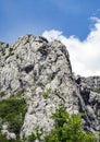 Climbers are climbing a rocky mountain in Paklenica, Croatia Royalty Free Stock Photo