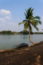 Paknm tree and boat at Mekong Delta, Don Det, Laos