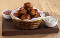Pakoda Indian Vegetarian Snack and Coconut Chutney and Tomato Ketchup