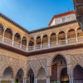 Palace of Alcazar, Famous Andalusian Architecture. Old Arab Palace in Seville, Spain. Ornamented Arch and Column Royalty Free Stock Photo