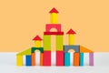 Palace from blocks of children\'s constructor on a orange background