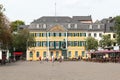 Palace FÃÂ¼rstenberg and general post office german Hauptpost, Postamt with statue of Ludwig van Beethoven on square MÃÂ¼nsterplatz Royalty Free Stock Photo