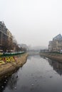 Palace of Justice building Palatul Justitiei early in the morning. View over Dambovita river in Bucharest, Romania, 2020 Royalty Free Stock Photo