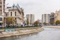 The Palace of Justice and the modern buildings at the banks of the Dambovita River in the center of Bucharest City, Romania Royalty Free Stock Photo