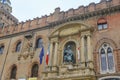 Palace Palazzo d\'Accursio in Bologna, Italy with statue of the Pope Gregory XIIItion site. Construction works