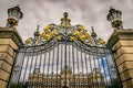 A palace seen through ornamental gates Royalty Free Stock Photo