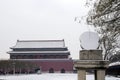 palace and sundial of forbidden city in snowing