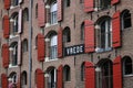 Palace windows with brick faÃÂ§ade in Amsterdam. Vrede Royalty Free Stock Photo