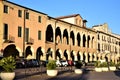 Palaces in Piazza del Santo in Padua, with the facades illuminated by the sun, close to sunset.