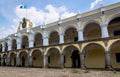 `Palacio de los Capitanes Generales` - Palace of the Captains General with country flag in Antigua, Guatemala Royalty Free Stock Photo