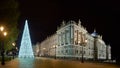 Palacio Real illuminated by a White Christmas Tree. Madrid, Spain Royalty Free Stock Photo