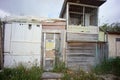 palafitico pier built in a disorganized and rustic way. recycled building materials forming a popularly designated area for tent