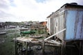 palafitico pier built in a disorganized and rustic way. recycled building materials forming a popularly designated area for tents