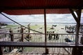 palafitico pier built in a disorganized and rustic way. recycled building materials forming a popularly designated area for tents