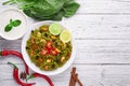 Palak Paneer Biryani and Raita at white background with decor. Palak Paneer Biryani is vegetarian indian cuisine dish